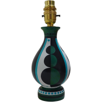 Topiary table lamp base in a vase shape with colourful geometric design of circles in blue, green and black. Hand painted individually by Cressida Bell, granddaughter of Vanessa Bell.